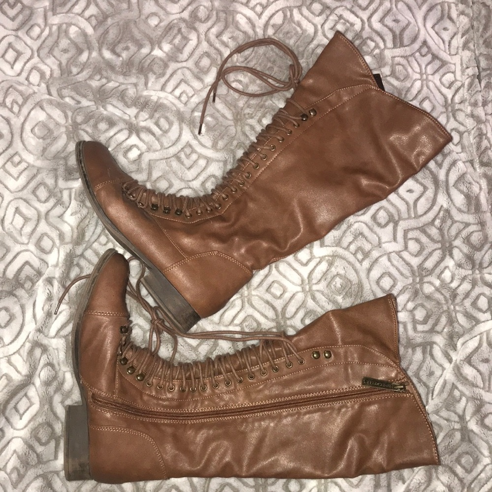 Laced knee high boots